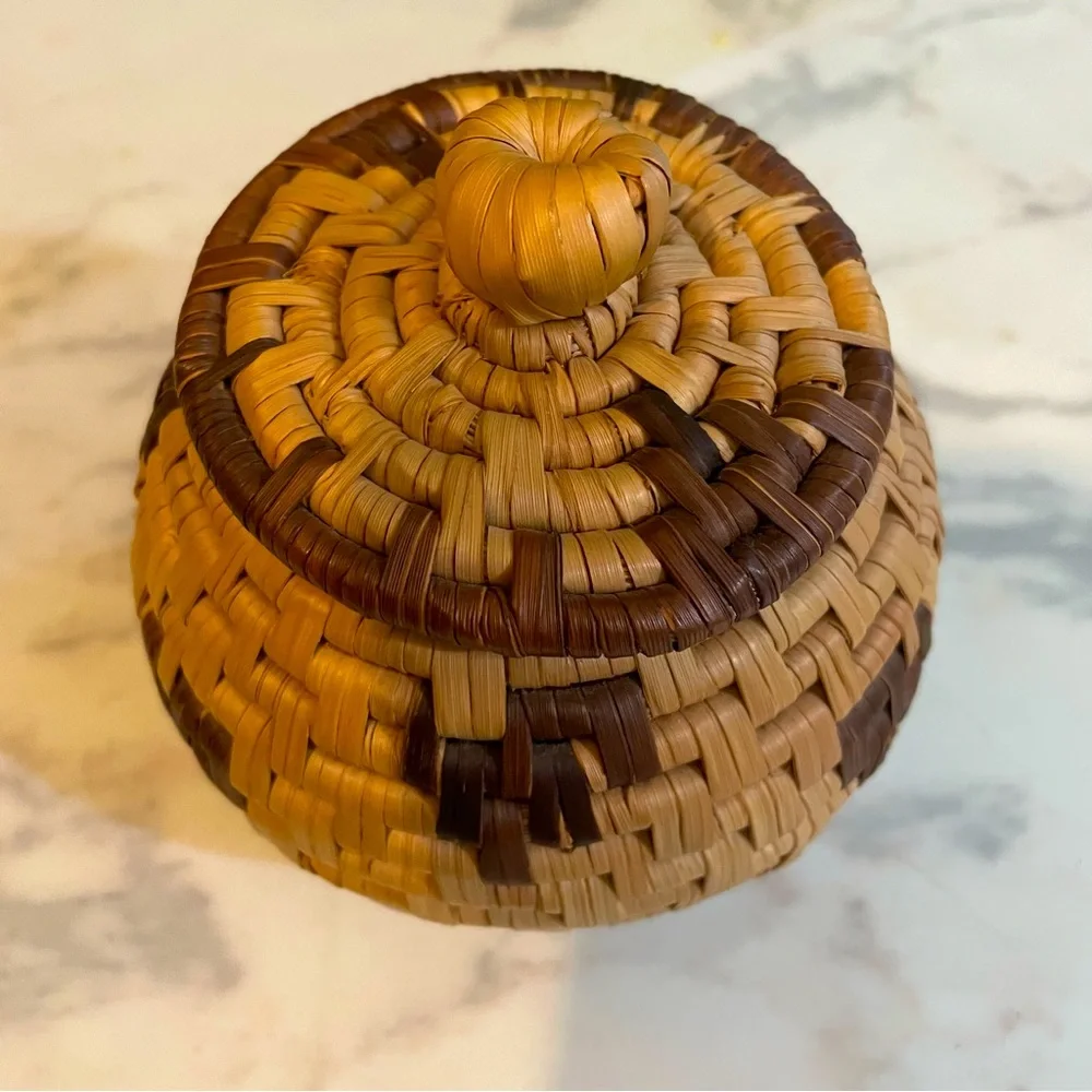 Miniature Hand Woven basket with lid. 4 1/2 inches x 4 1/2 inches.